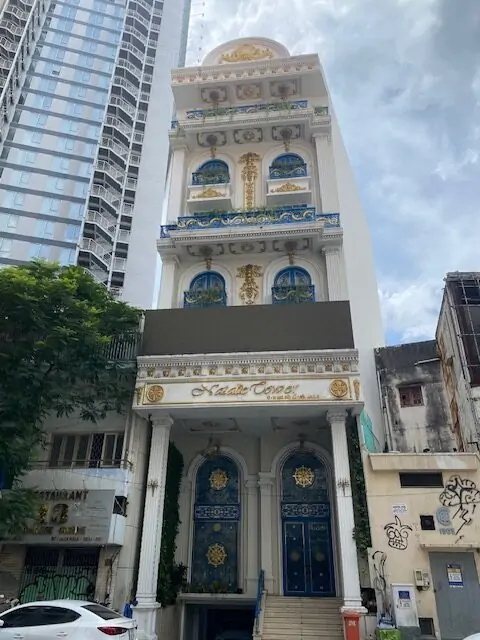 Ornate building facade in Ho Chi Minh City, Vietnam