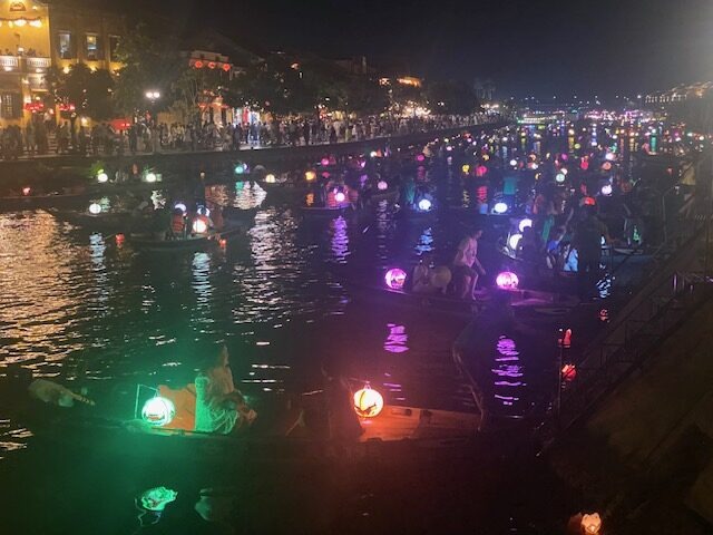 Lantern boats on the river in Hoi An, Vietnam at dusk